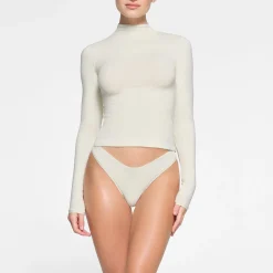 COTTON JERSEY LONG SLEEVE TURTLENECK | BONE