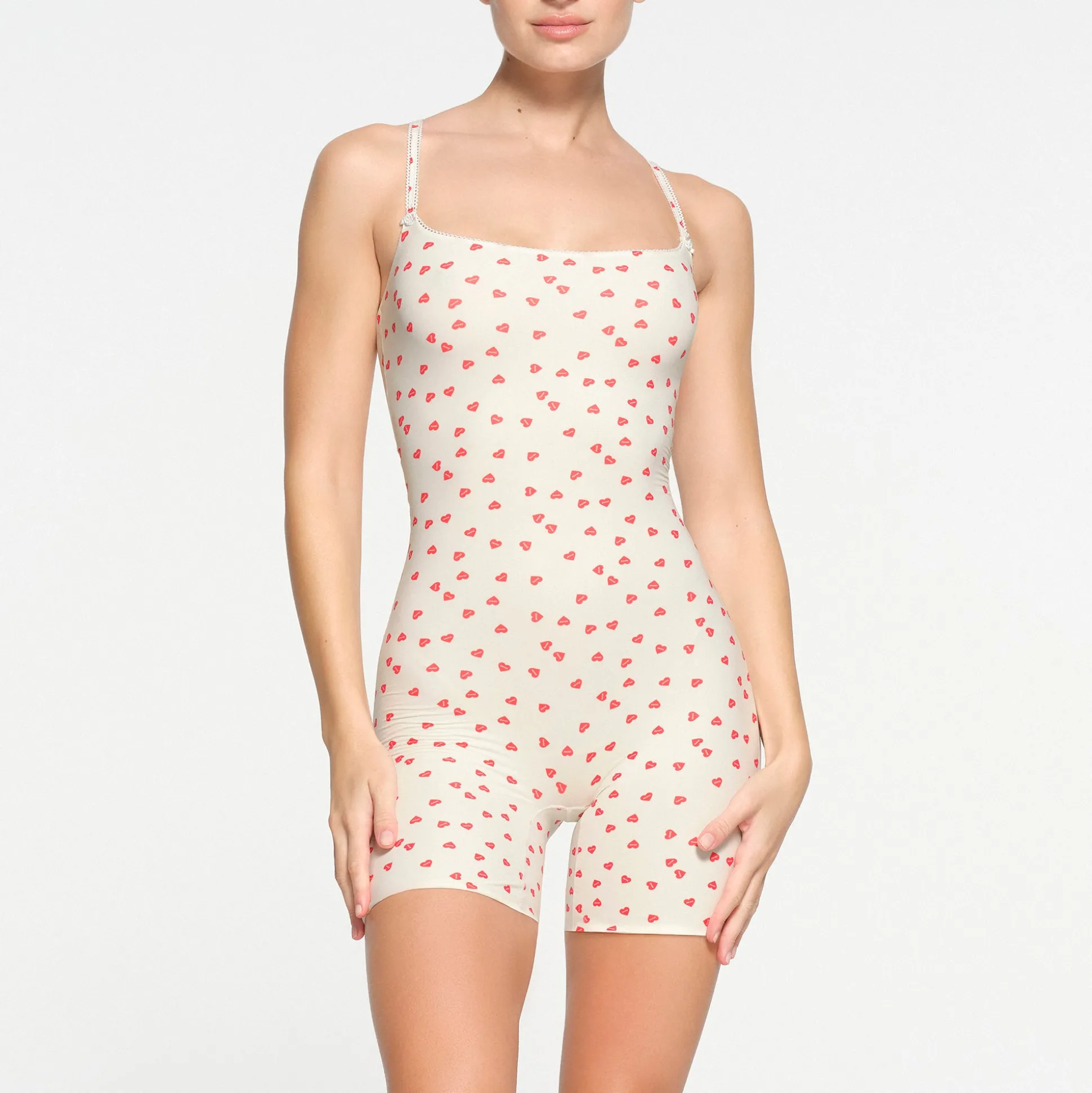 FITS EVERYBODY PICOT TRIM ONESIE | RUBY HEART PRINT