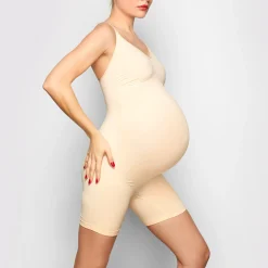 MATERNITY SCULPTING BODYSUIT MID THIGH | SAND