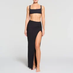 RAW EDGE SLIT LONG SKIRT | ONYX