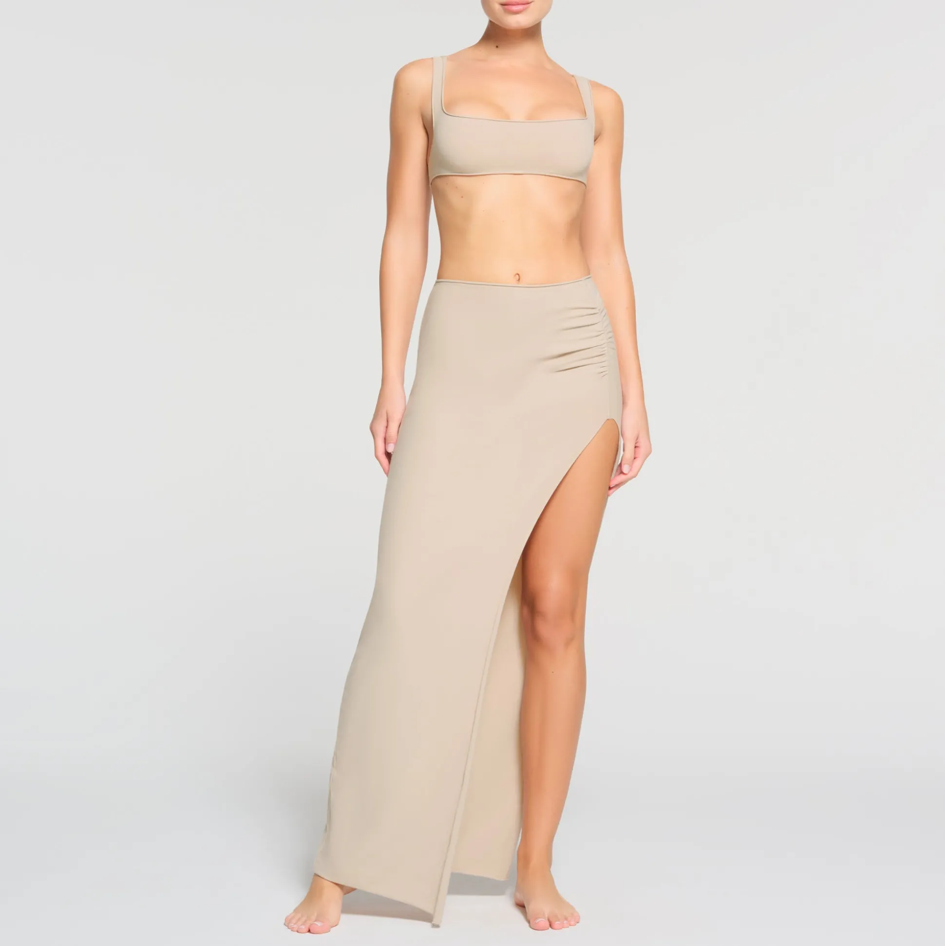 RAW EDGE SLIT LONG SKIRT | STONE