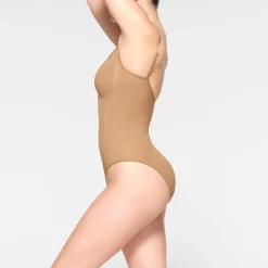 SEAMLESS SCULPT BRIEF BODYSUIT | OCHRE