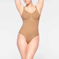SEAMLESS SCULPT BRIEF BODYSUIT | OCHRE