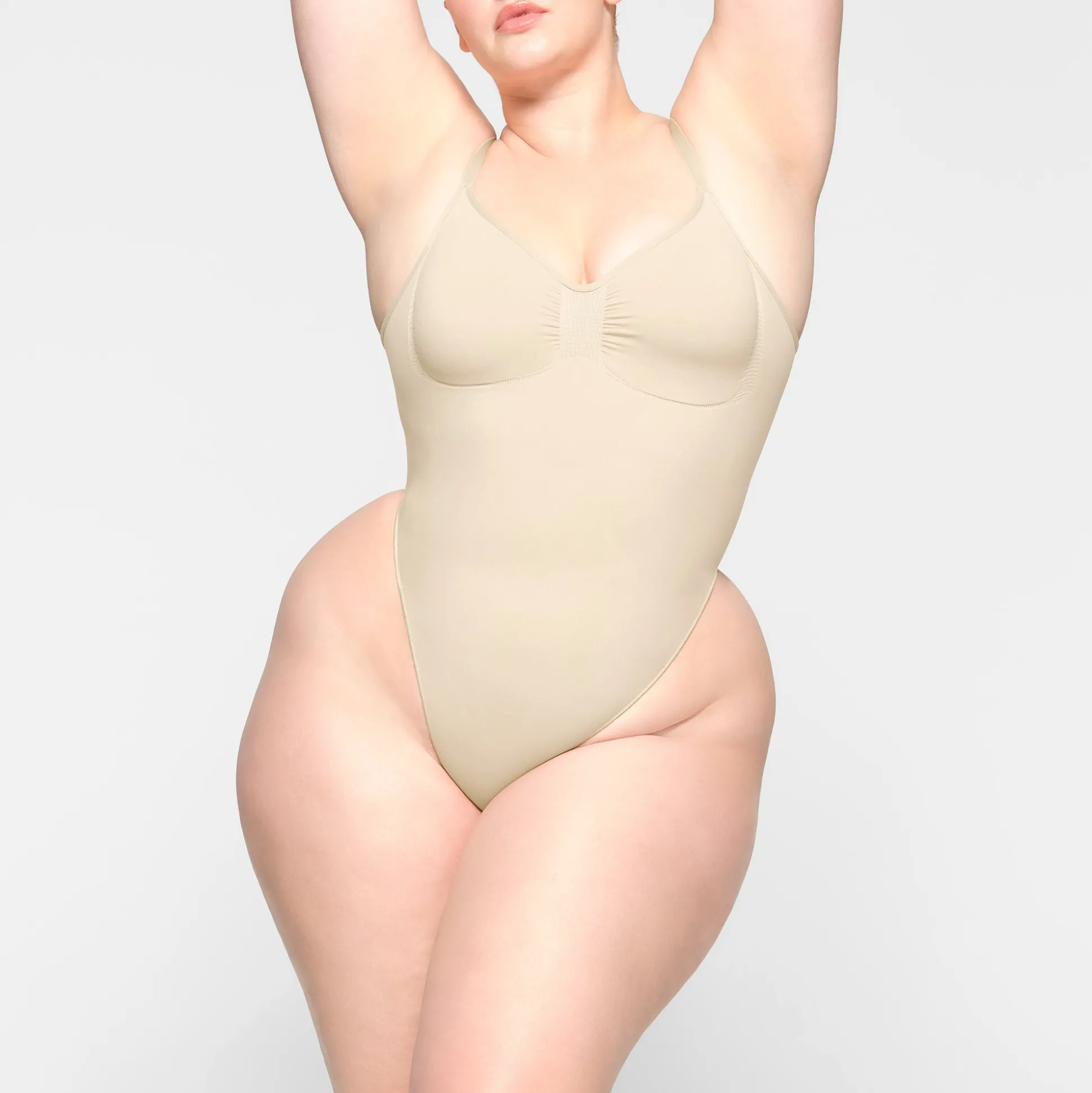 SEAMLESS SCULPT LOW BACK THONG BODYSUIT | SAND