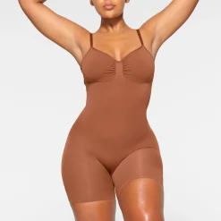 SEAMLESS SCULPT LOW BACK MID THIGH BODYSUIT | BRONZE