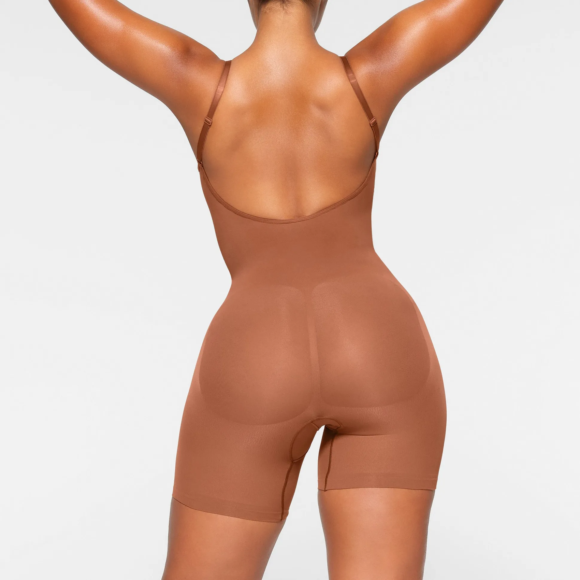 SEAMLESS SCULPT LOW BACK MID THIGH BODYSUIT | BRONZE