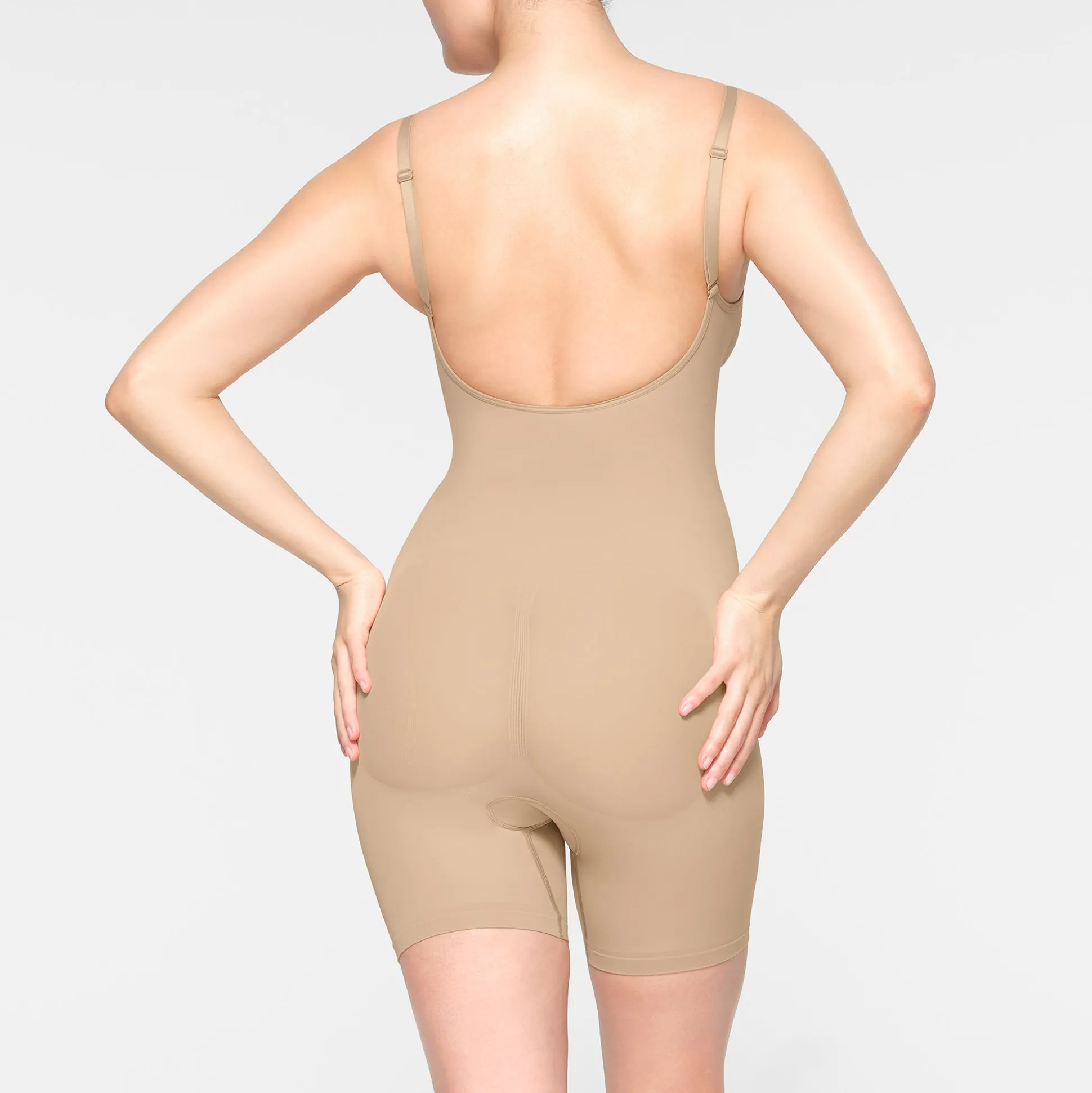 SEAMLESS SCULPT LOW BACK MID THIGH BODYSUIT | CLAY