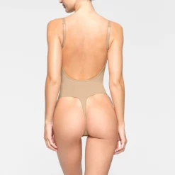 SEAMLESS SCULPT LOW BACK THONG BODYSUIT | CLAY