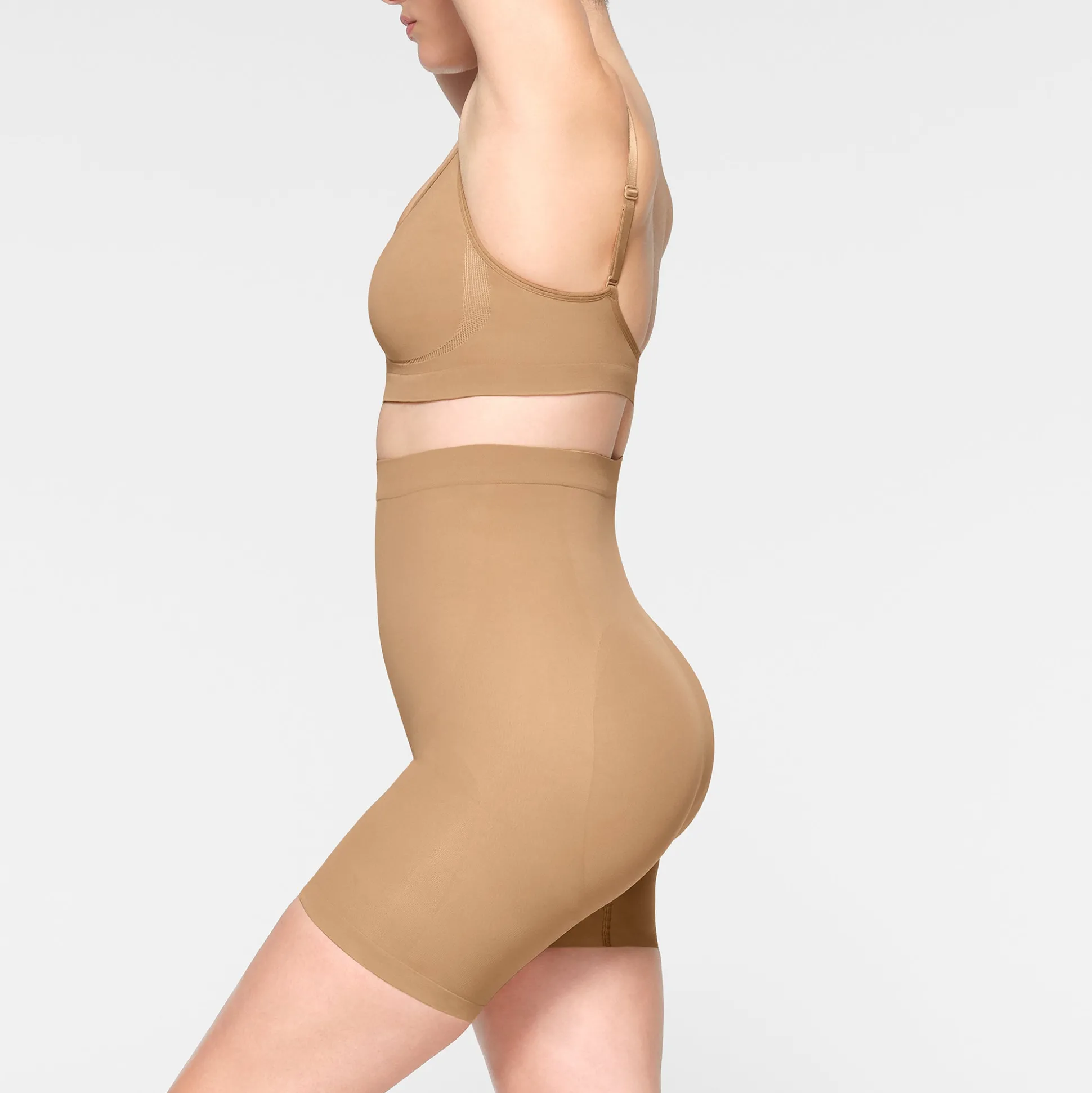 SEAMLESS SCULPT MID THIGH SHORT | OCHRE