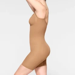 SEAMLESS SCULPT MID THIGH BODYSUIT | OCHRE