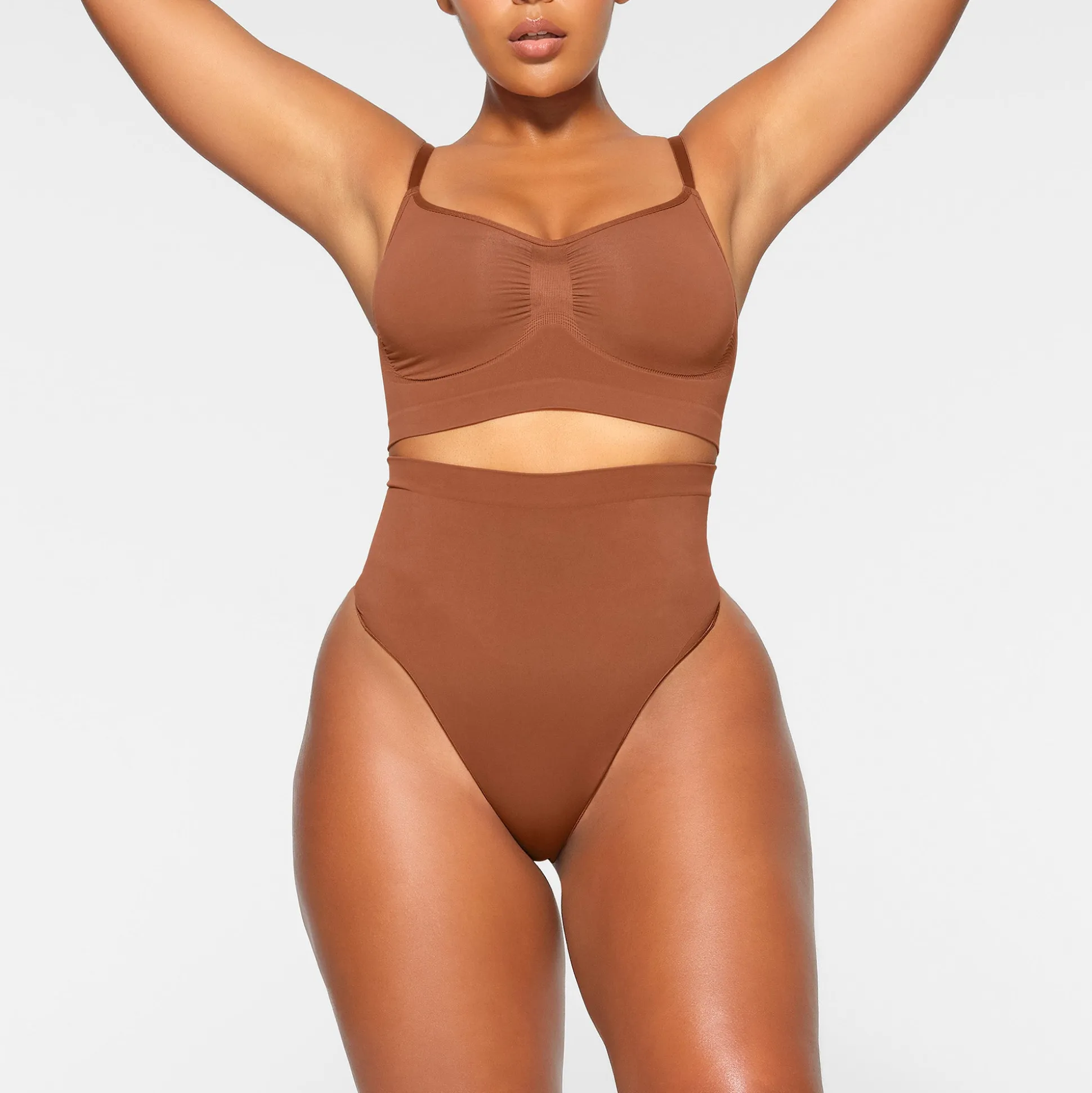 SEAMLESS SCULPT MID WAIST THONG | BRONZE