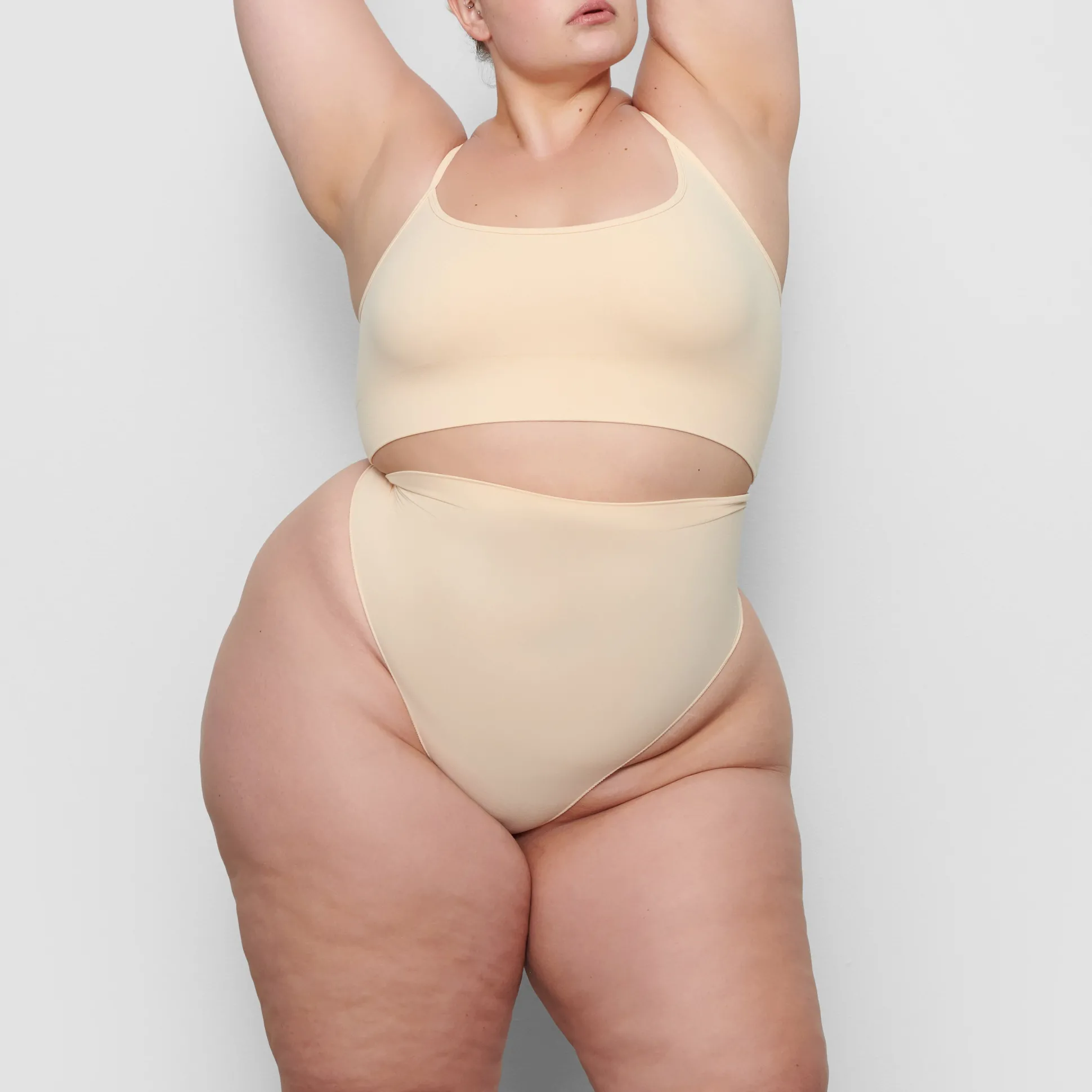 SEAMLESS SCULPT MID WAIST THONG | SAND