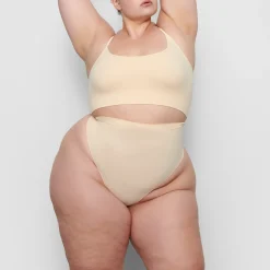 SEAMLESS SCULPT MID WAIST THONG | SAND