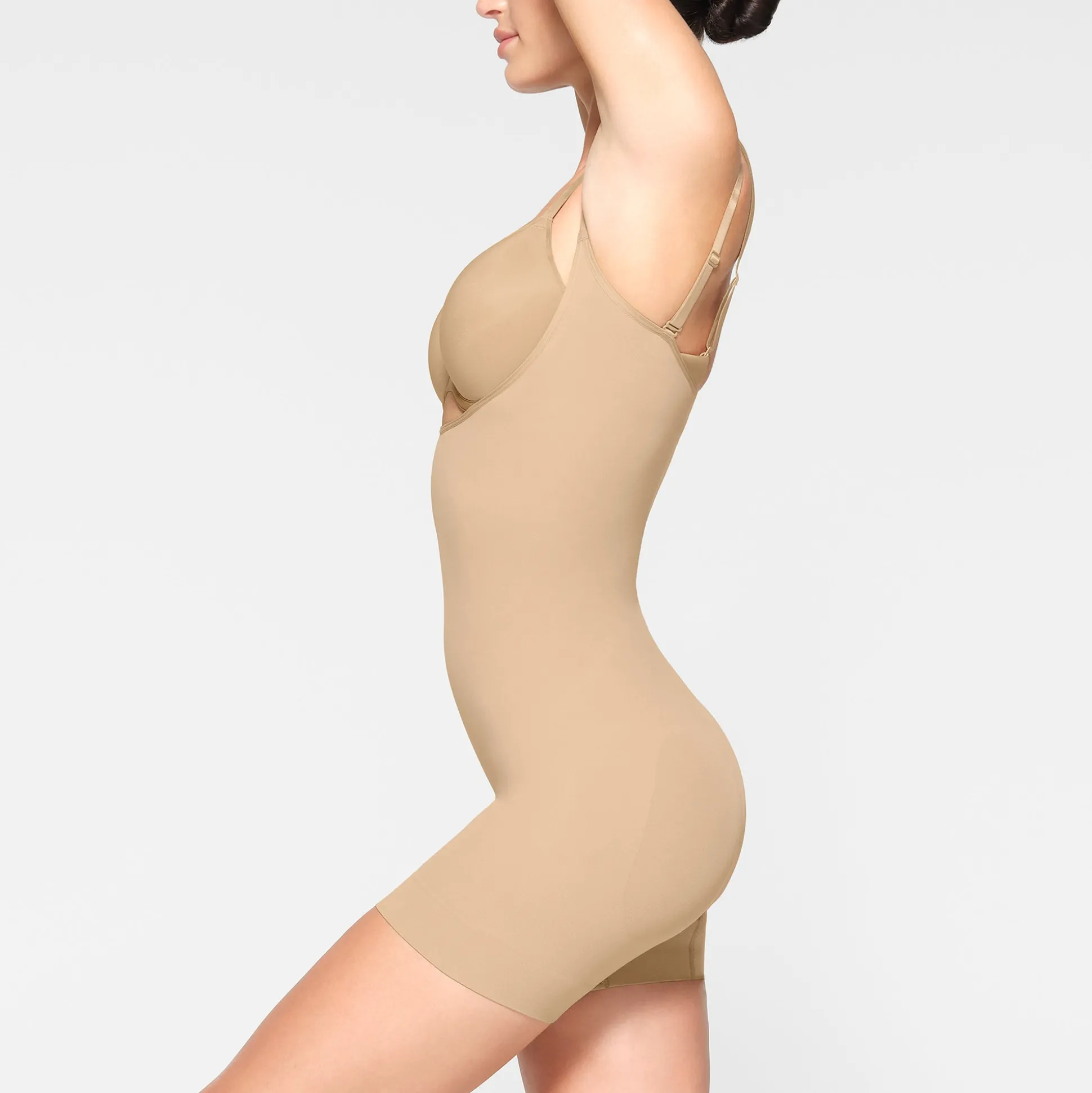 SEAMLESS SCULPT OPEN BUST SHORTIE BODYSUIT | CLAY