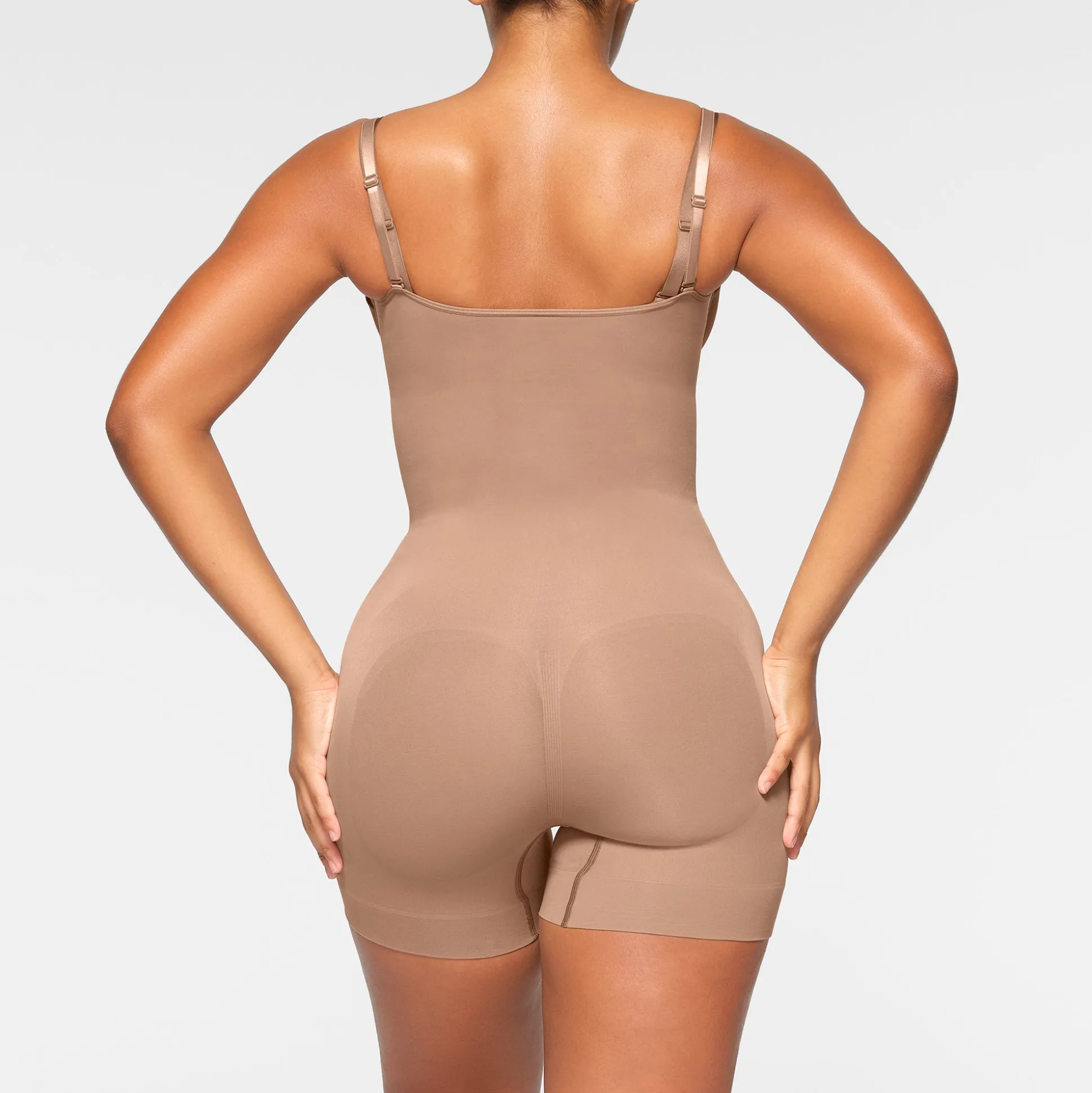 SEAMLESS SCULPT OPEN BUST SHORTIE BODYSUIT | SIENNA