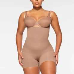 SEAMLESS SCULPT OPEN BUST SHORTIE BODYSUIT | SIENNA