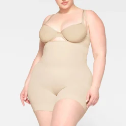SEAMLESS SCULPT OPEN BUST SHORTIE BODYSUIT | SAND