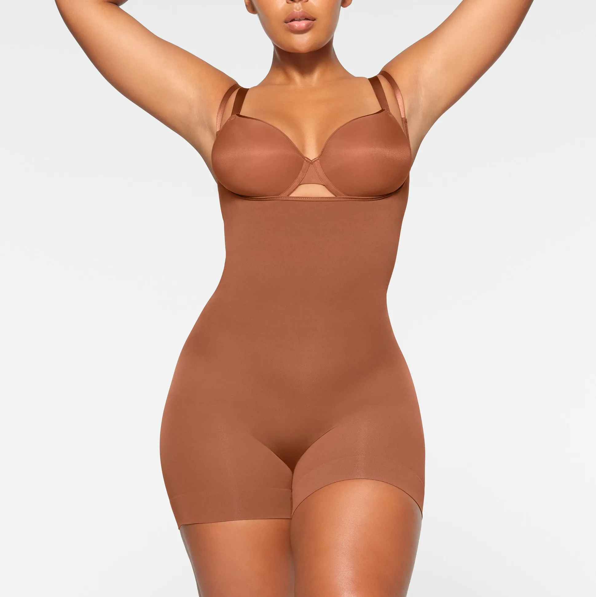 SEAMLESS SCULPT OPEN BUST SHORTIE BODYSUIT | BRONZE