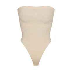 SEAMLESS SCULPT STRAPLESS THONG BODYSUIT | SAND