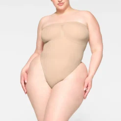 SEAMLESS SCULPT STRAPLESS THONG BODYSUIT | MICA