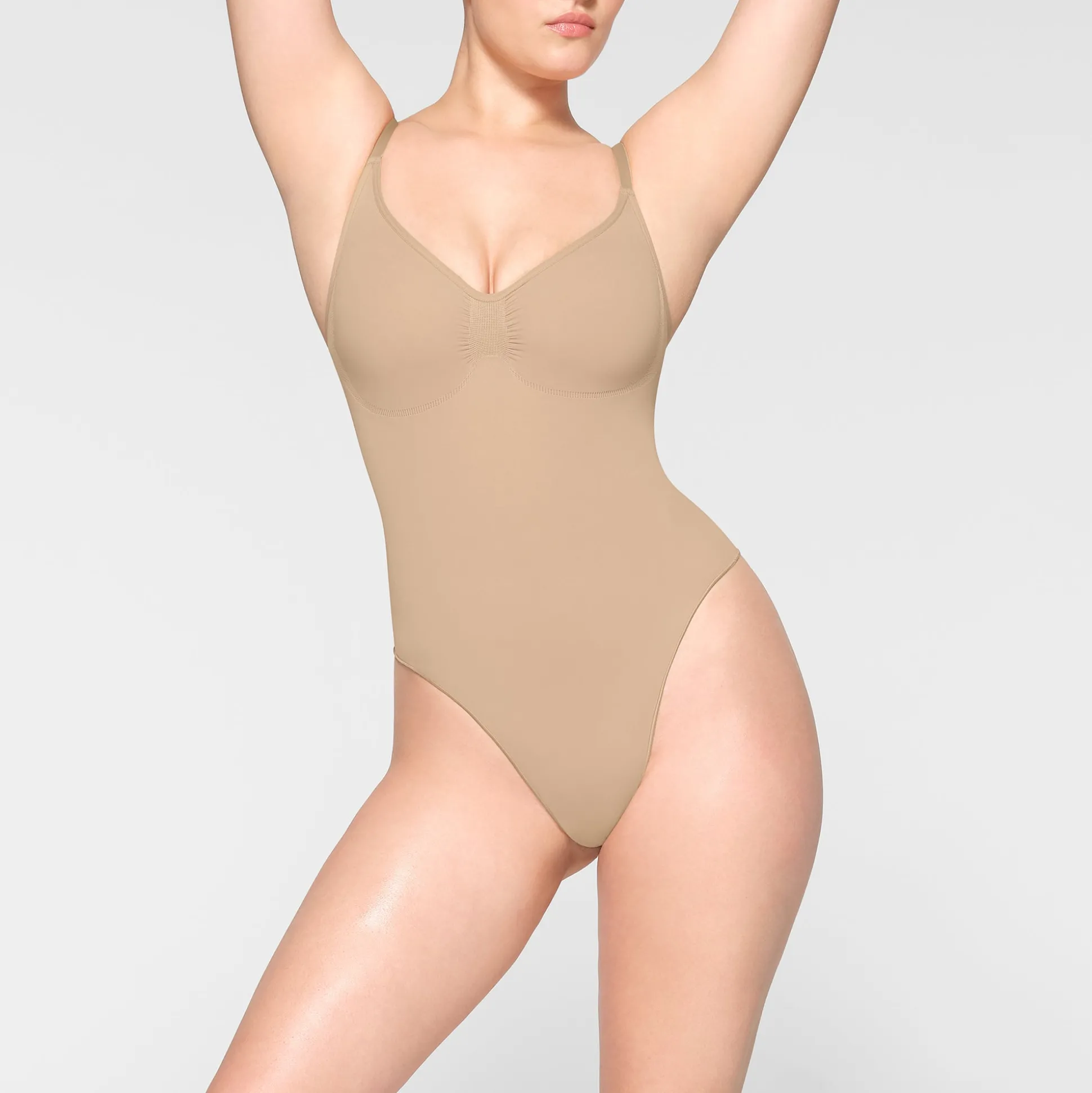 SEAMLESS SCULPT THONG BODYSUIT | CLAY