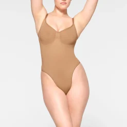 SEAMLESS SCULPT THONG BODYSUIT | OCHRE