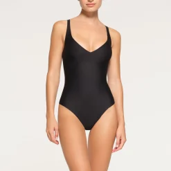 SKIMS BODY UNLINED PLUNGE THONG BODYSUIT | ONYX