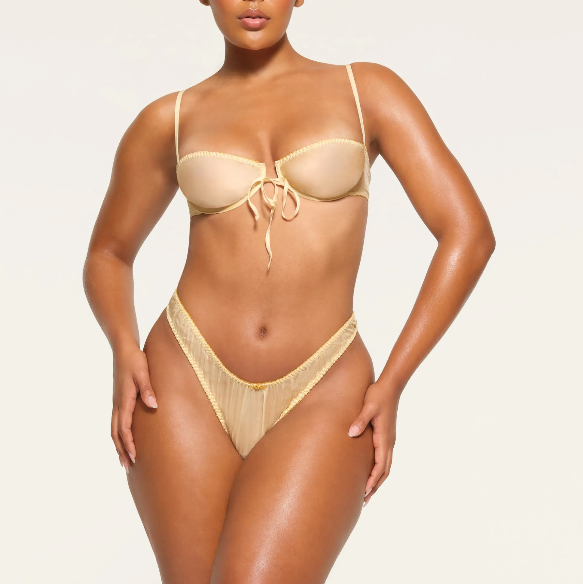 SKIMS ROMANCE DIPPED THONG | BUTTER